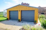 Garagem de madeira pré-fabricada para 2 carros SILVIA DUO ALT (34 mm + revestimento), 6x6 m, 36 m² customer 2